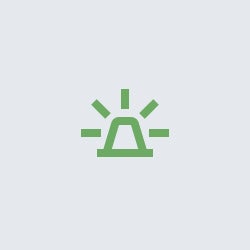 A green emergency light icon on a white background