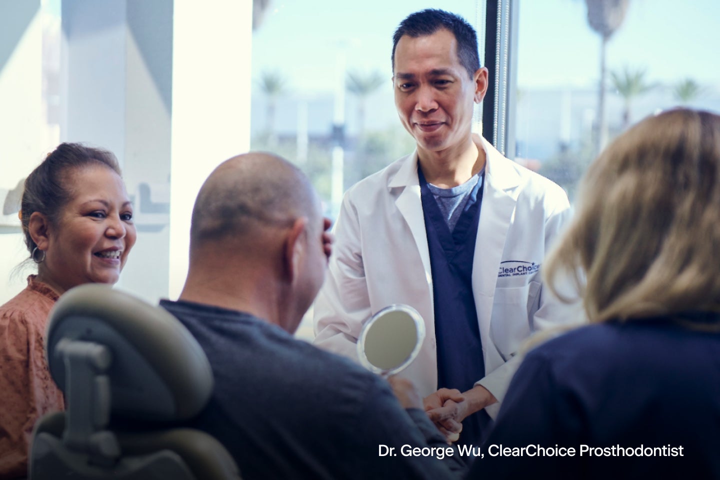 Dr. George Wu, a ClearChoice Prosthodontist, discusses with a patient what to expect on the day of dental implant surgery.