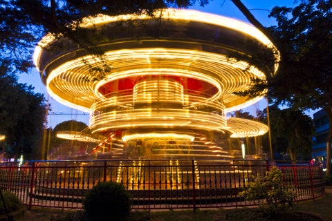 Carousel at Lignano City Center at night in Italy