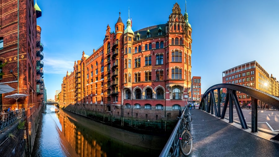 Hamburg City Center with its dynamic cityscape with historic brick warehouses of the Speicherstadt district in Germany
