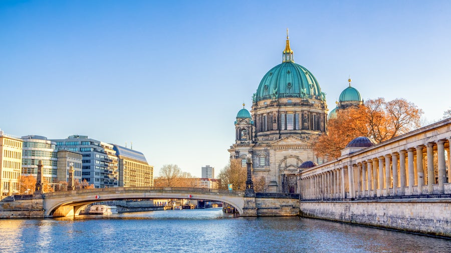 Berlin Cathedral (Berliner Dom) surrounded by lush gardens and situated near the Spree River in Germany