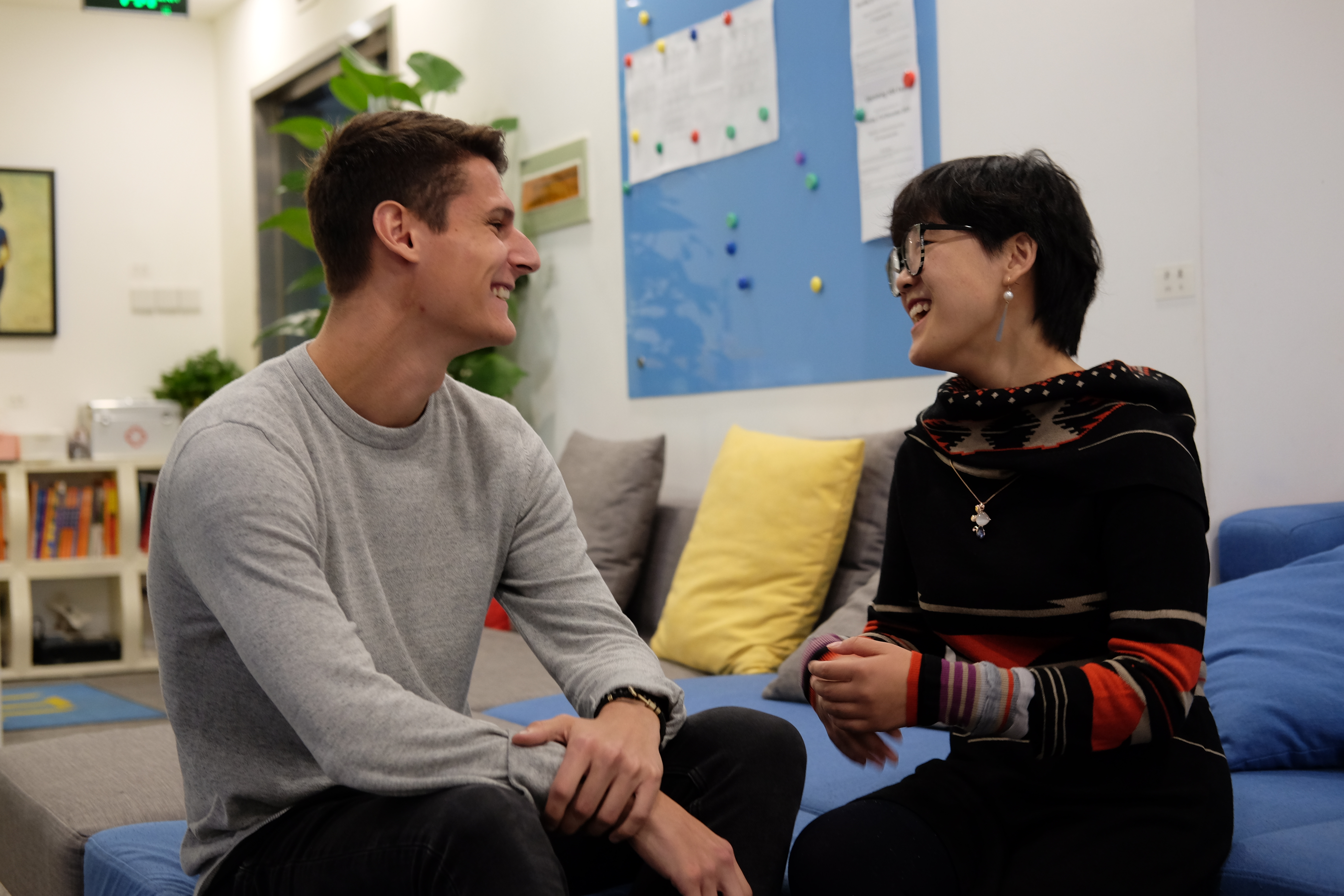 Two students sitting in the lounge at LTL Beijing