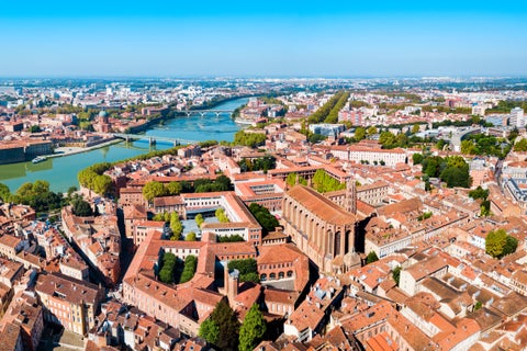 Aerial view of Toulouse City Center with it's historic buildings and Garonne River in France