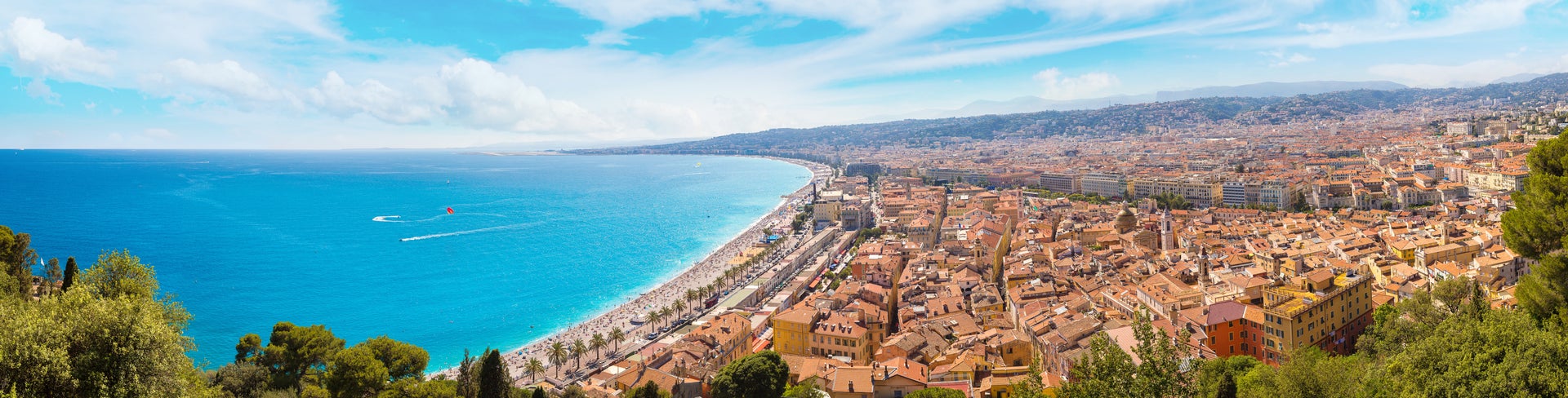 An aerial view of French Riviera, with it's colourful Mediterranean buildings and turquoise blue ocean