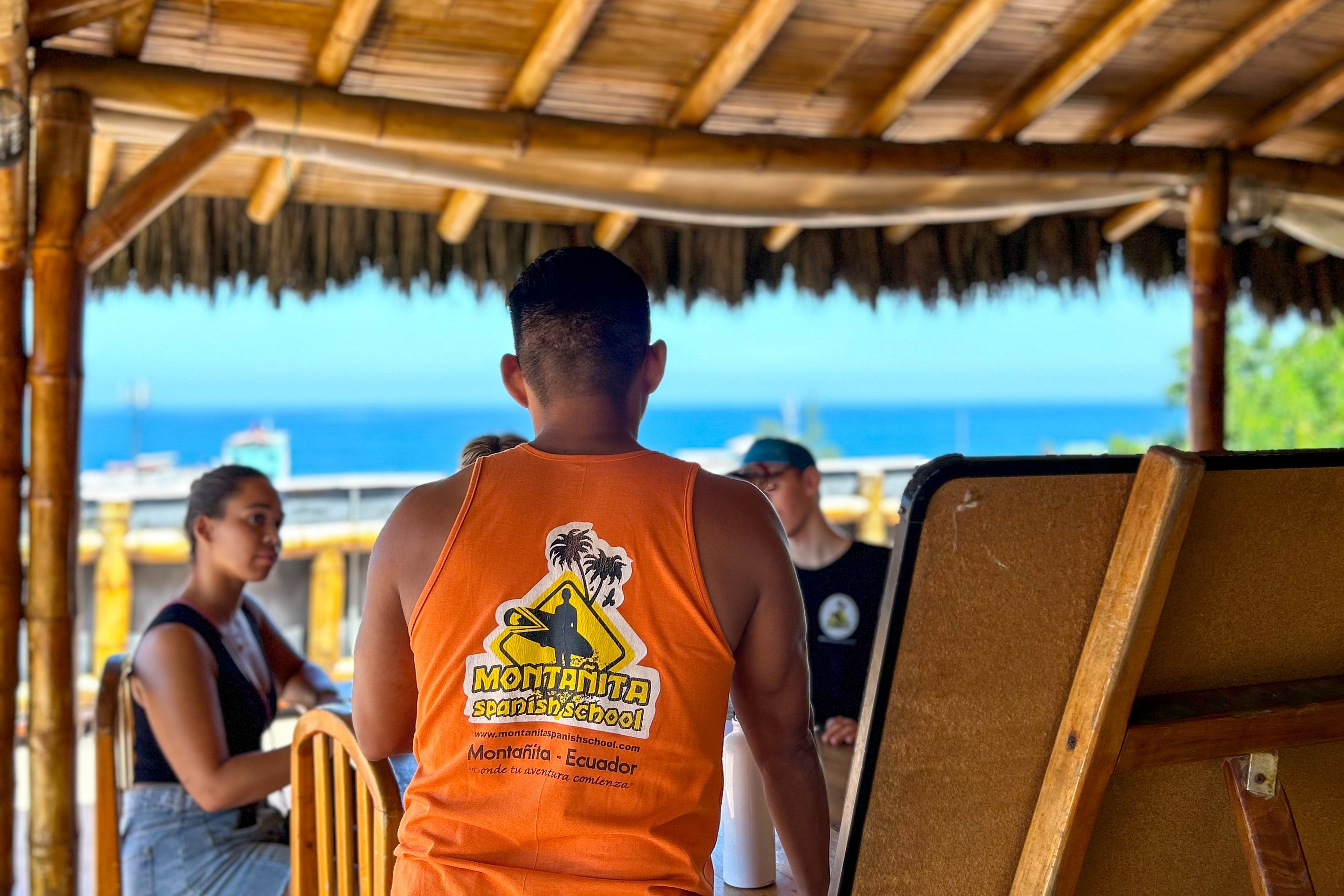 A class on the rooftop of the Montañita Spanish School