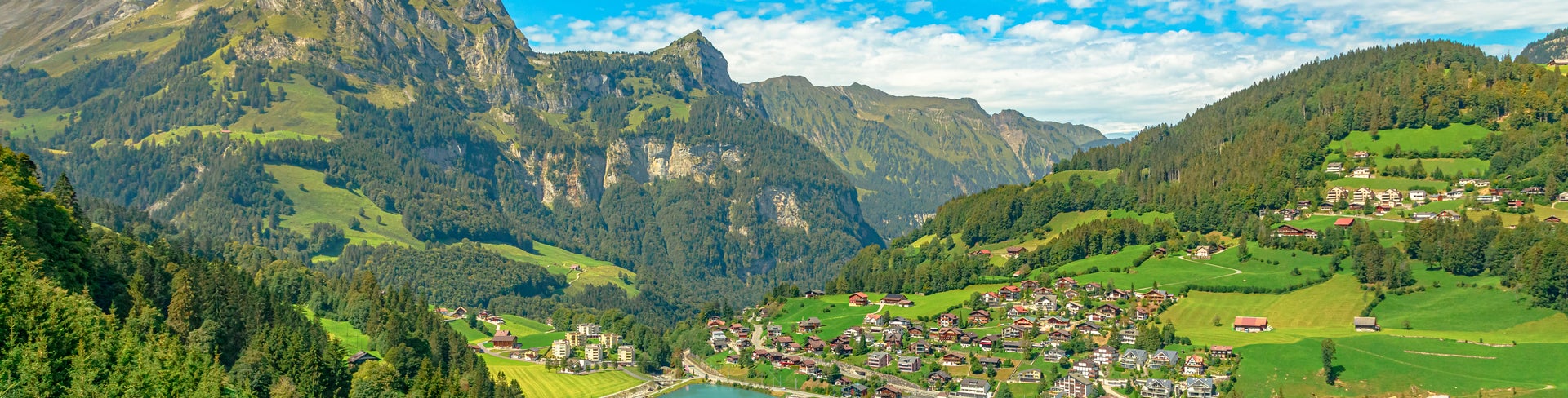 Trübsee lake in the mountains of Engelberg, Switzerland, surrounded by alpine scenery and rugged peaks