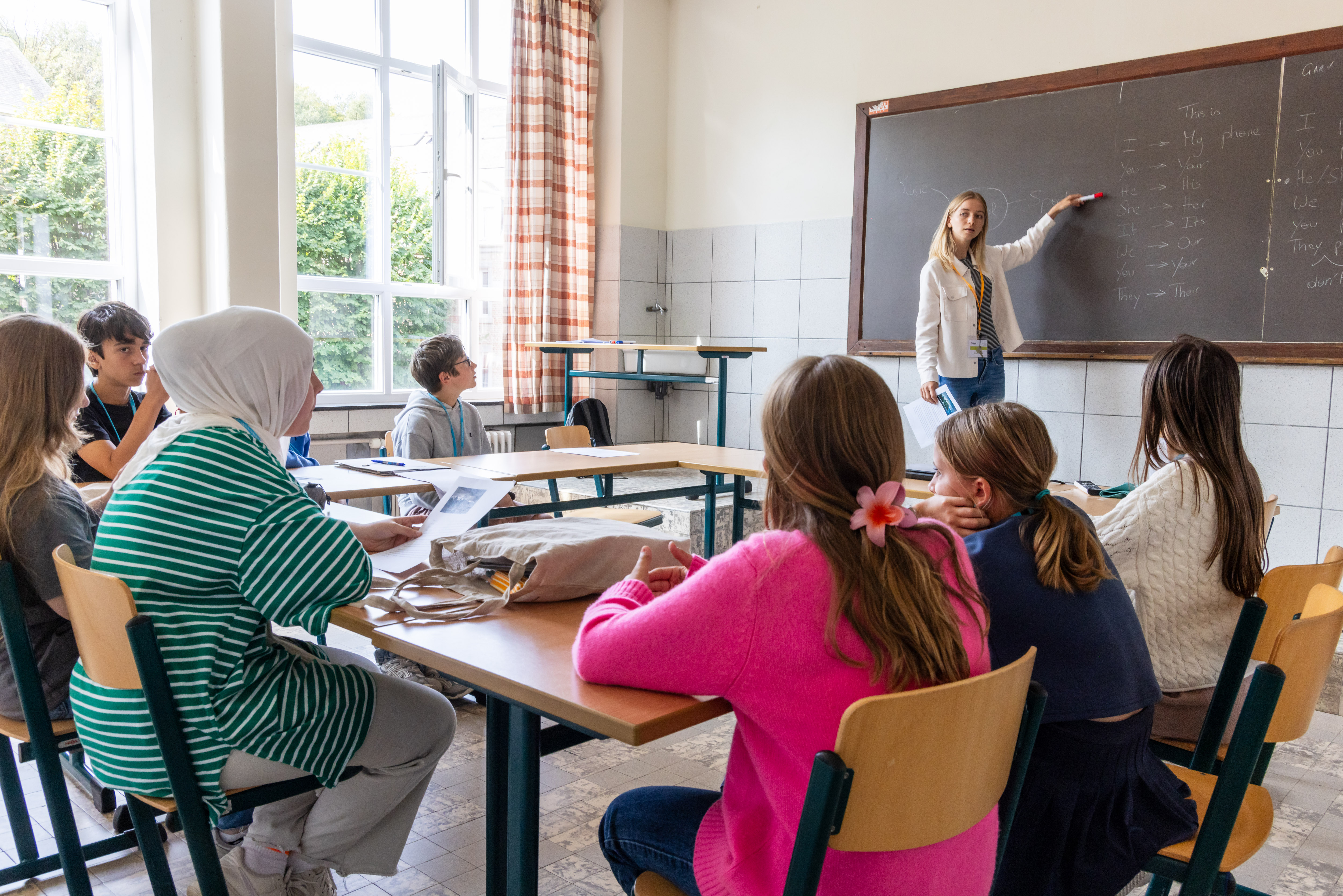 School classroom with students and teacher
