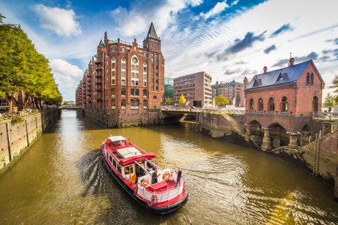 Hamburg City Center with its dynamic cityscape with historic brick warehouses of the Speicherstadt district in Germany