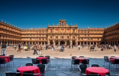 Baroque-style City Hall of Salamanca in Plaza Mayor, Spain, with ornate arches and historic architecture
