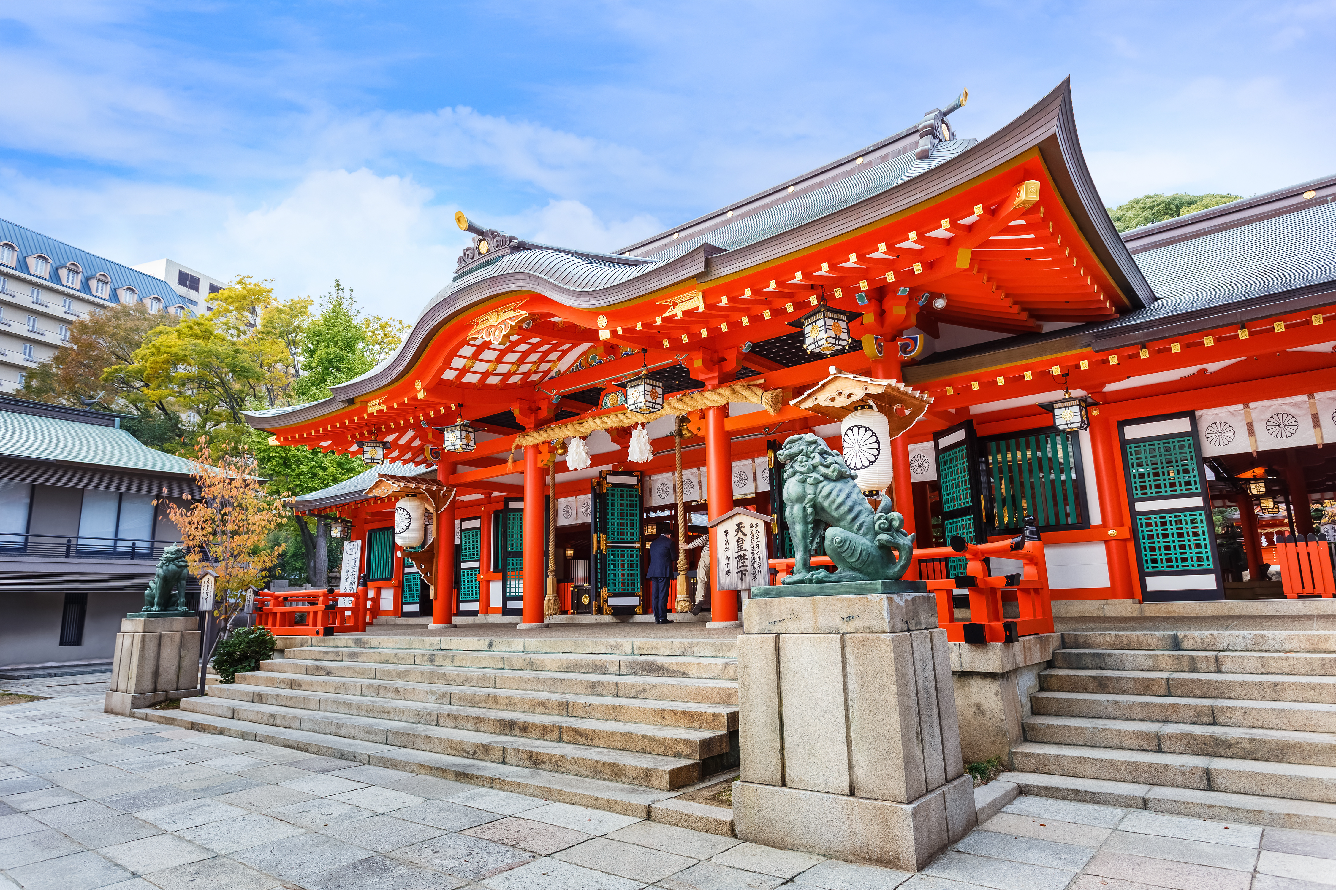Ikuta-jinja with its the historic Shinto shrine with its vibrant red torii gates and traditional architecture in in Kobe, Japan