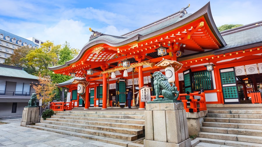 Ikuta-jinja with its the historic Shinto shrine with its vibrant red torii gates and traditional architecture in in Kobe, Japan