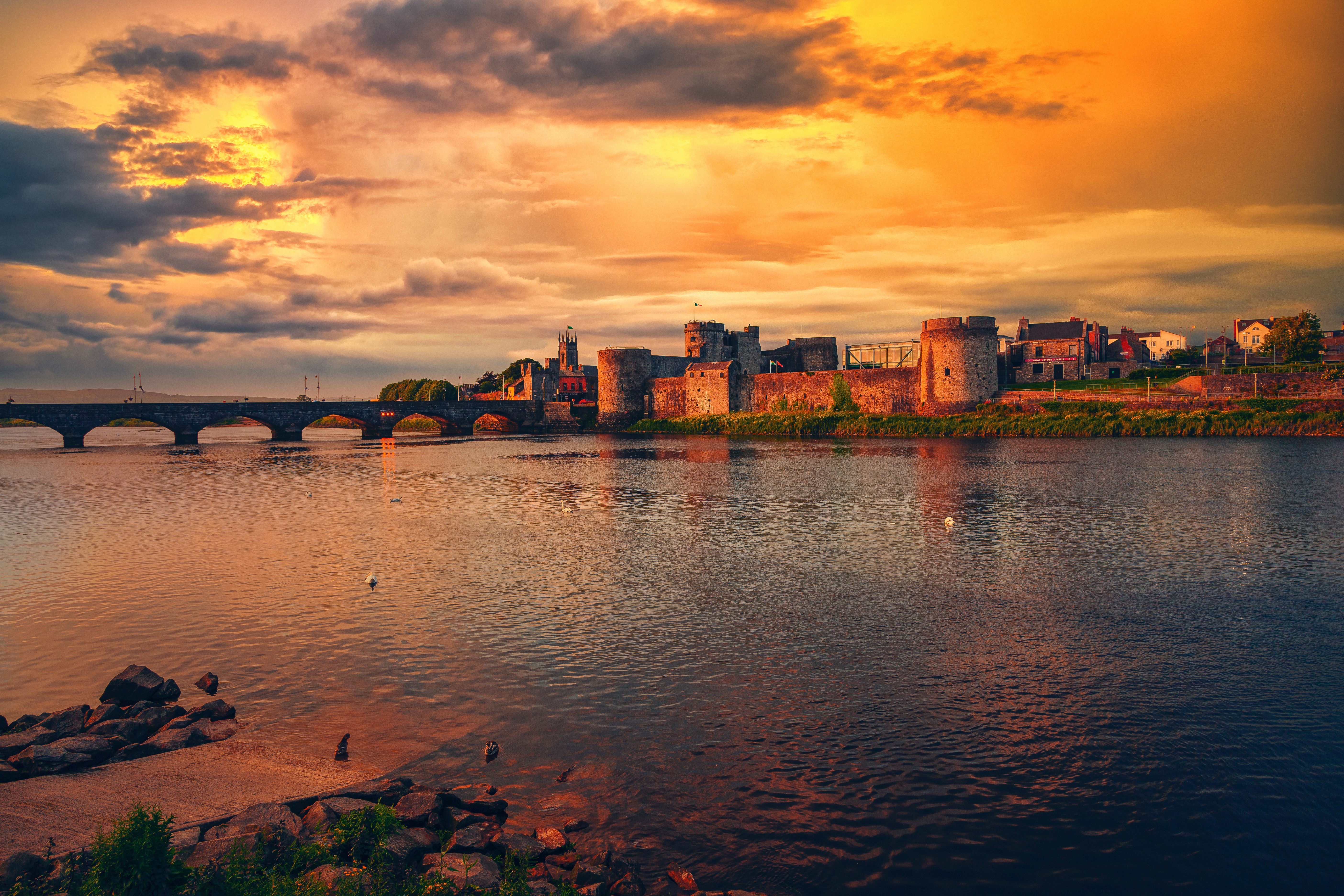 Limerick City Center at sunset featuring the  River Shannon and Thomond Bridge in Ireland