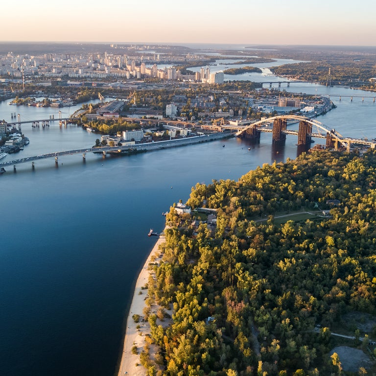 Aerial view of Kiev, Ukraine, featuring the Dnieper River and the Paton Bridge