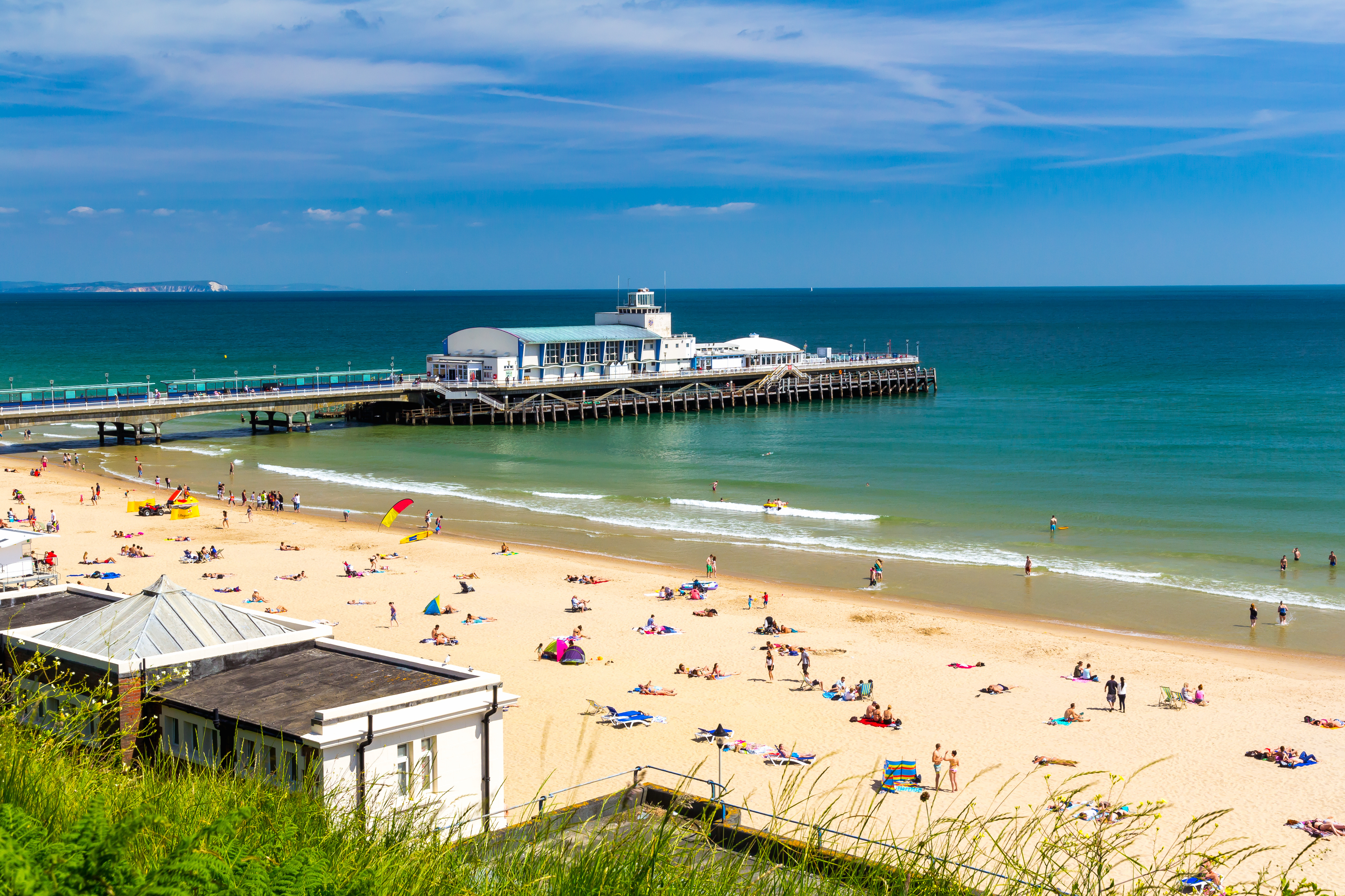 White sand Bournemouth Beach in Dorset UK with calm waters and scenic coastal view