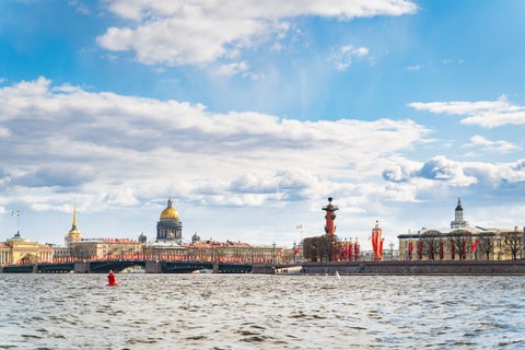 View of Saint Petersburg landmarks from the river, featuring the Winter Palace, Church of the Savior on Spilled Blood, and St. Isaac’s Cathedral, Russia