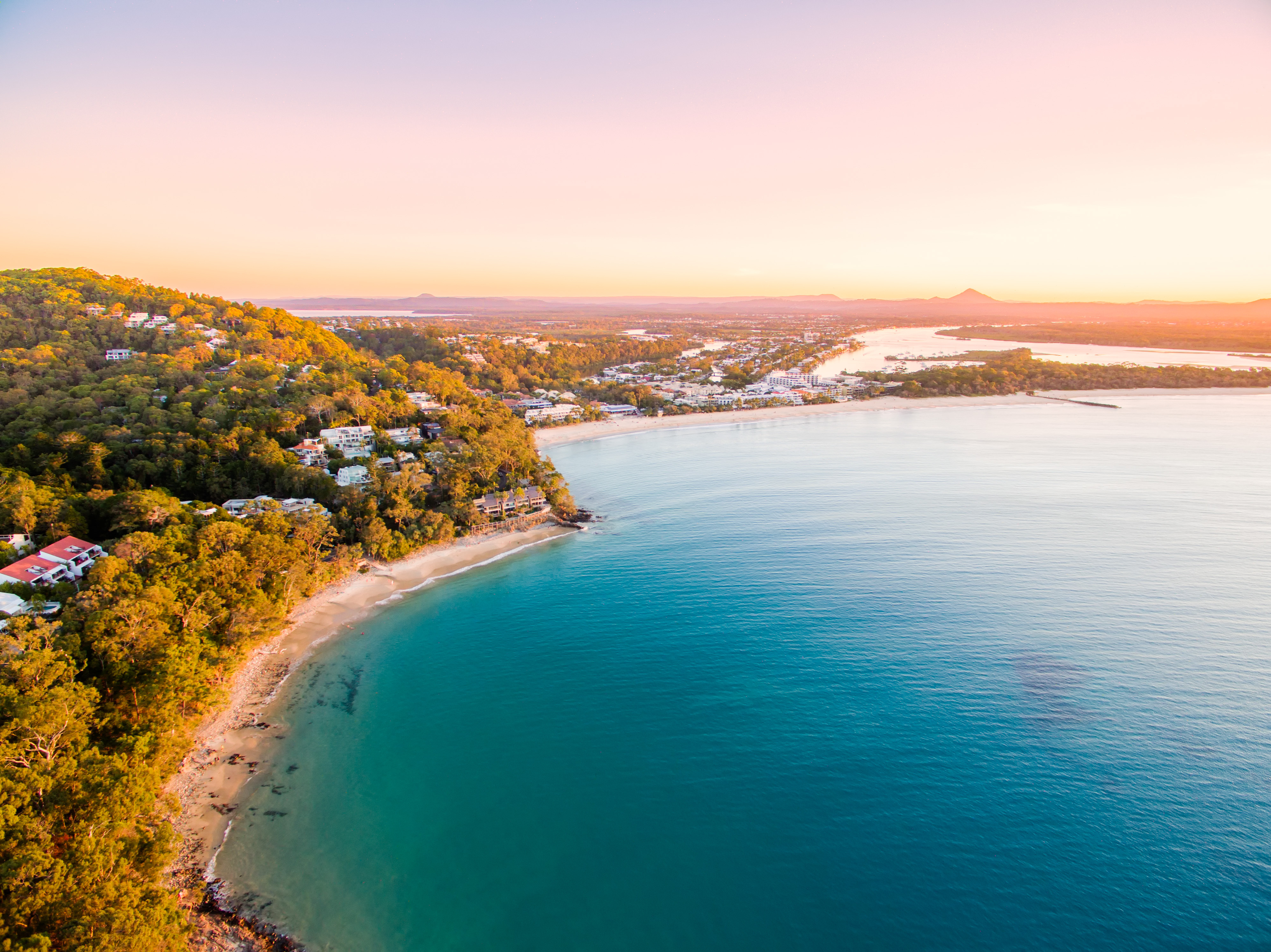 Aerial view of Noosa on Queensland's Sunshine Coast reveals a breathtaking blend of natural beauty and laid-back coastal living