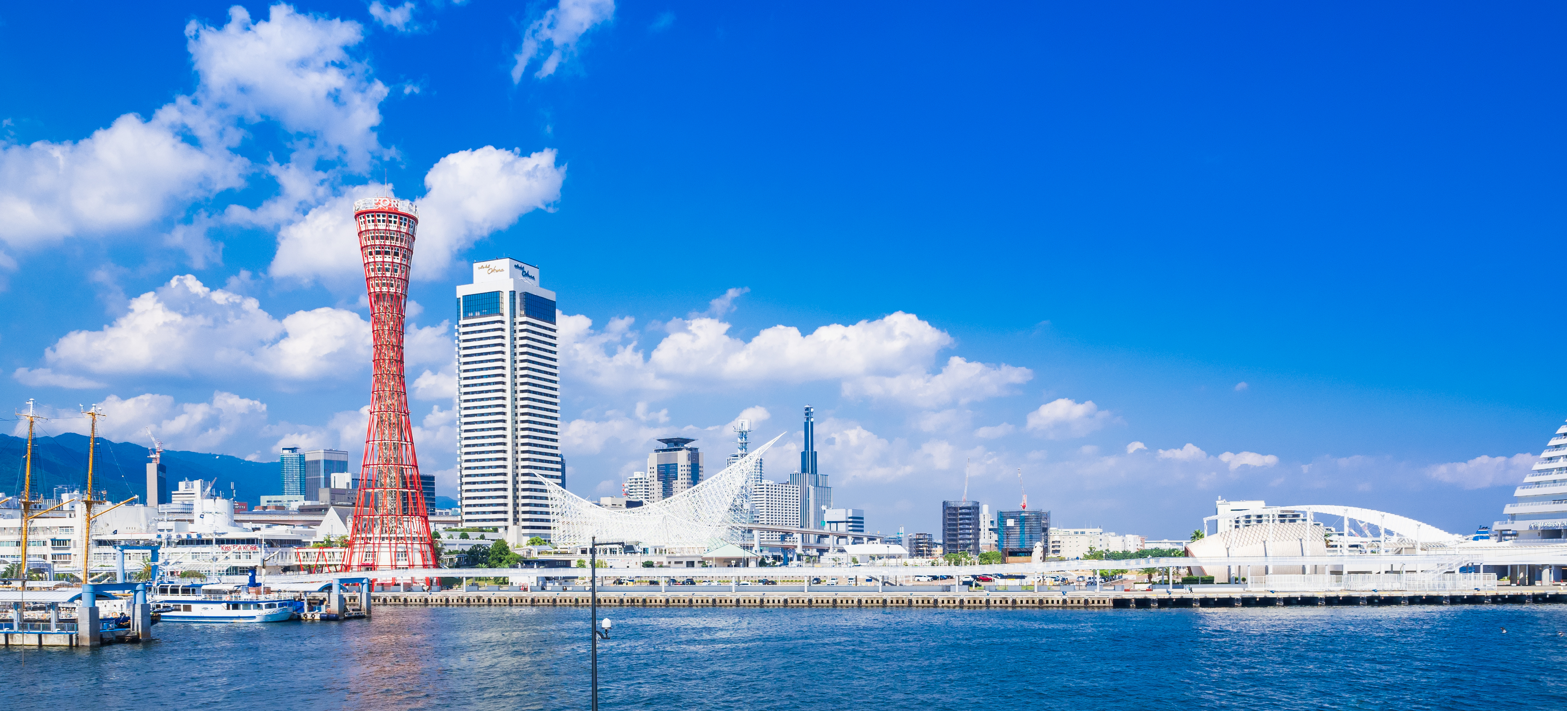 Waterfront with modern architecture and Kobe Port Tower in Kitano, Japan