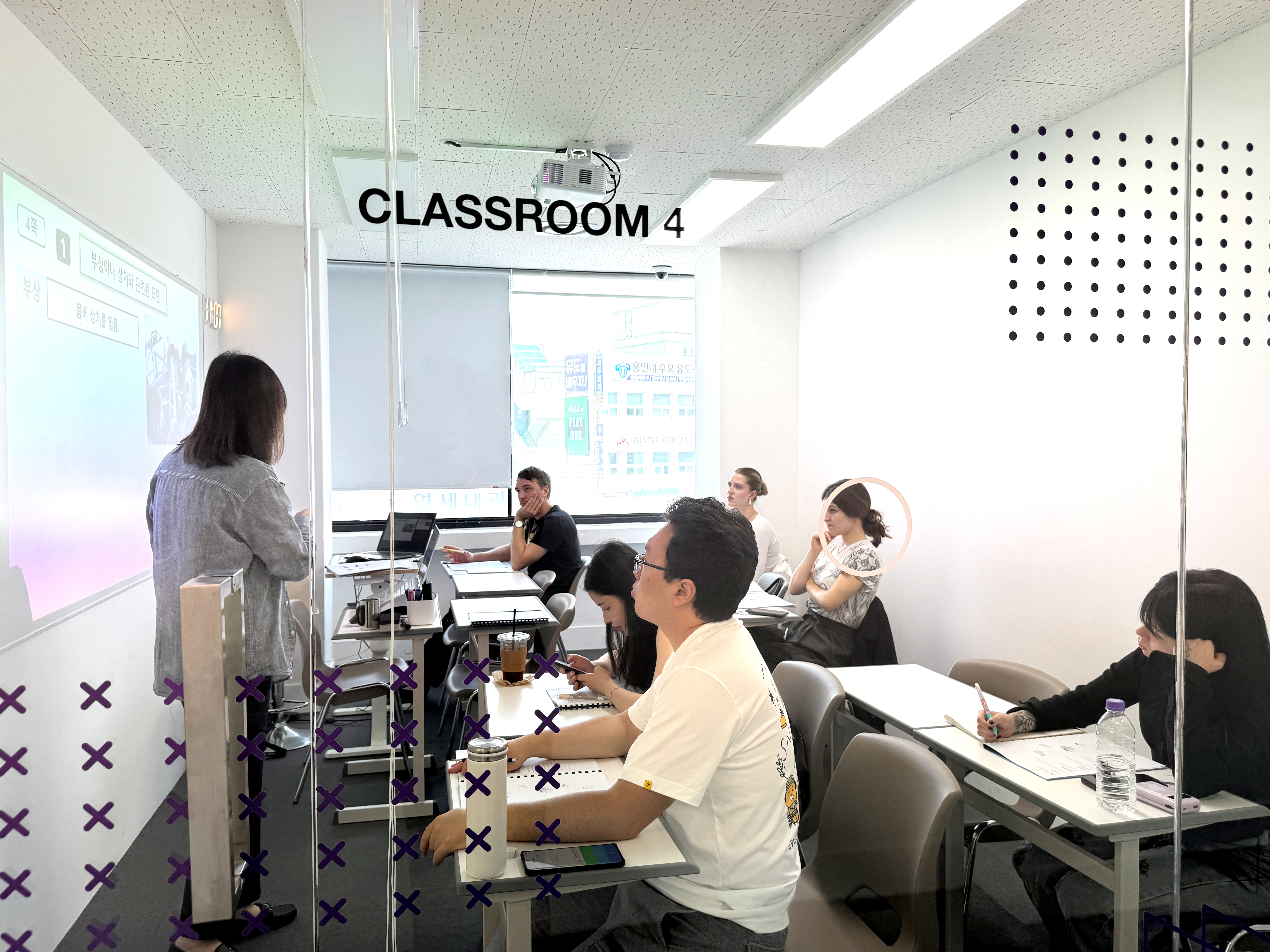 A female teacher explaining a lesson