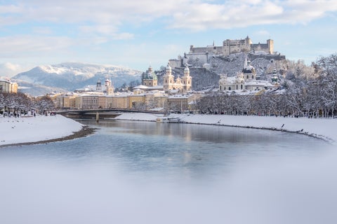 Panorama of Salzburg in winter Snowy historical center, Austria