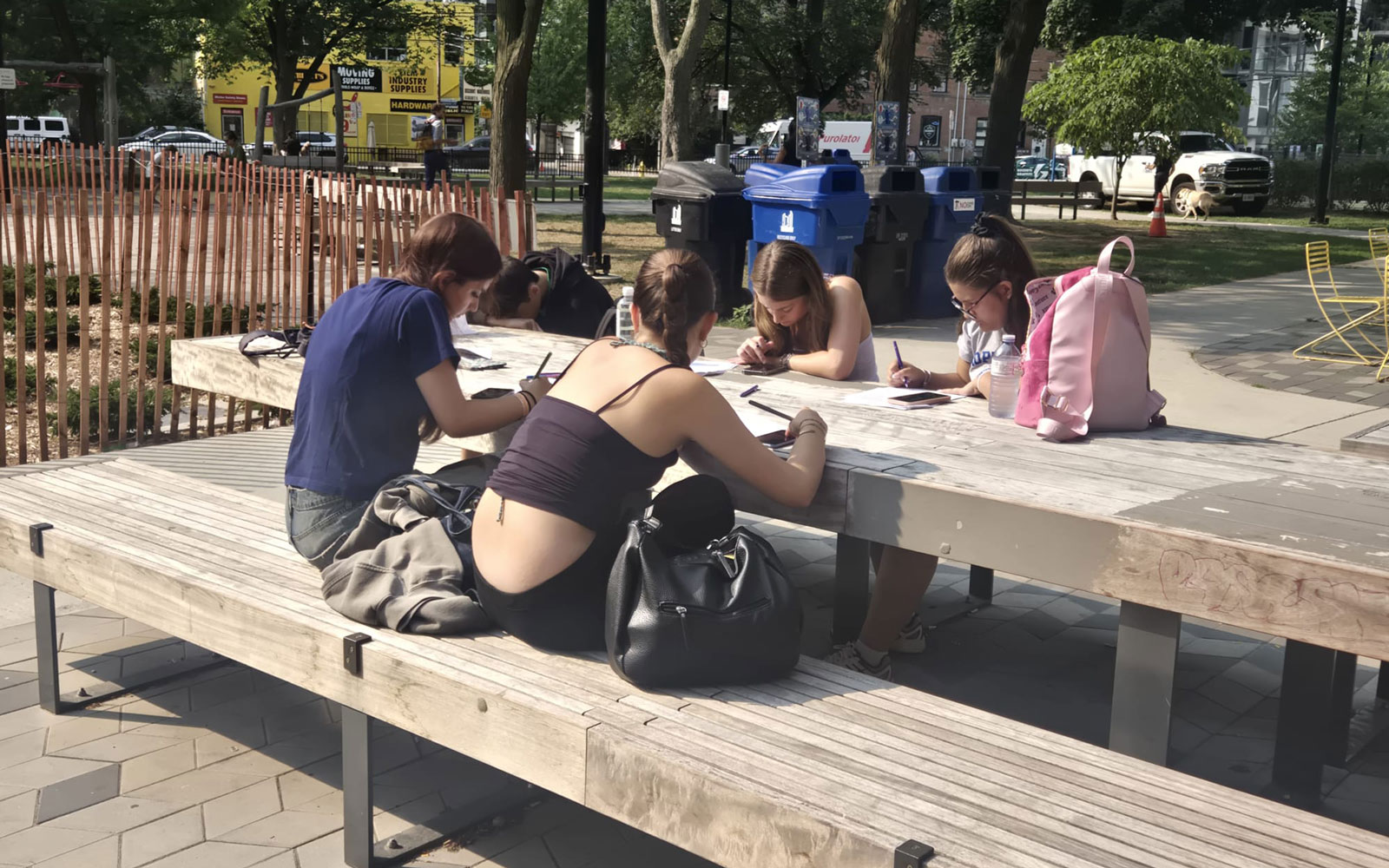 Students outside class in park