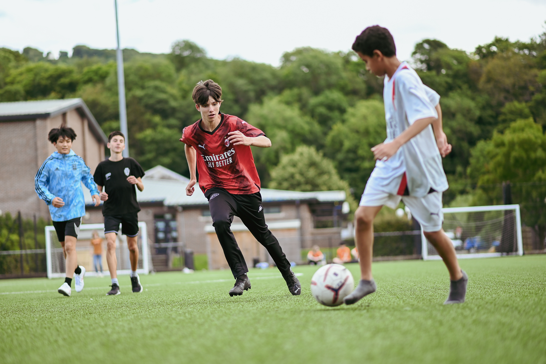 Students playing football in Monmouth