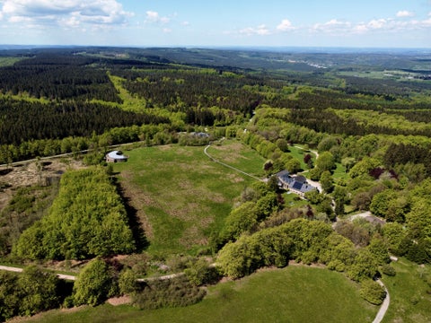 Domaine de Berinzenne in Spa, Belgium, with a landscape including tranquil lakes and scenic views