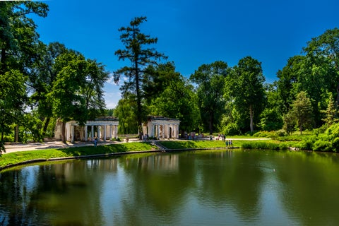 Mariinsky Park in Kiev, Ukraine, featuring lush greenery and a historic buildings