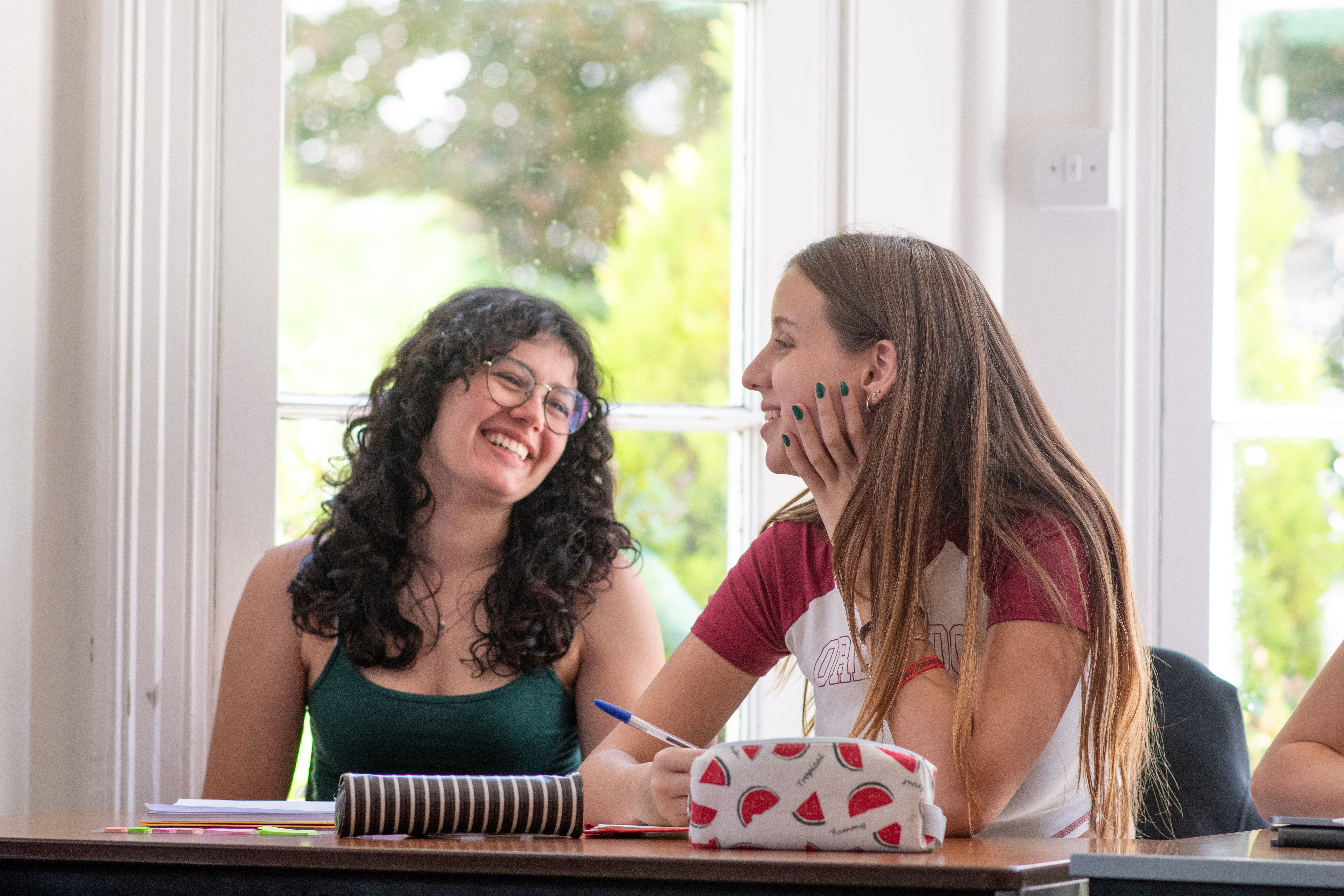 Two students in class at Eastbourne College Programme