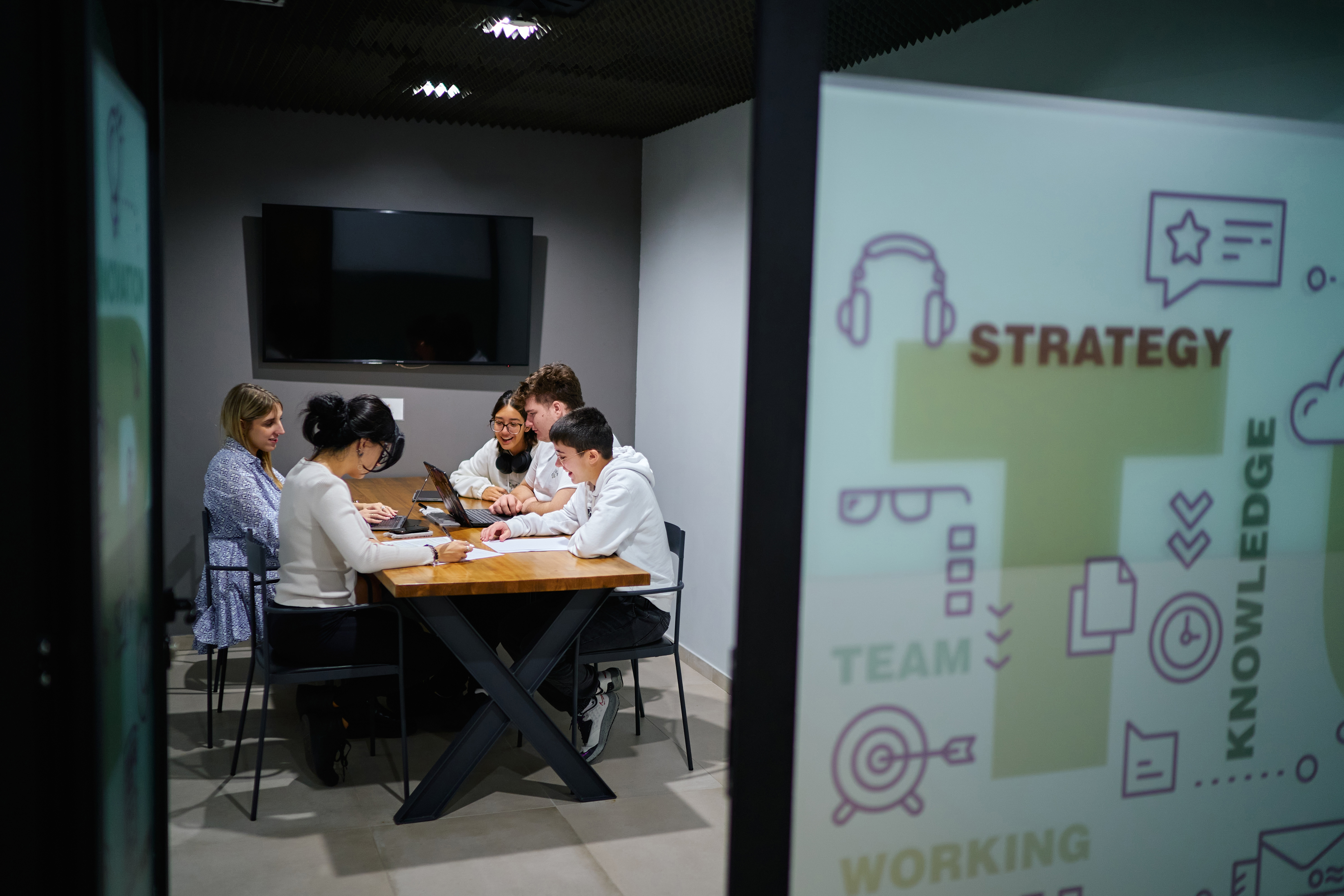 A few students in a classroom