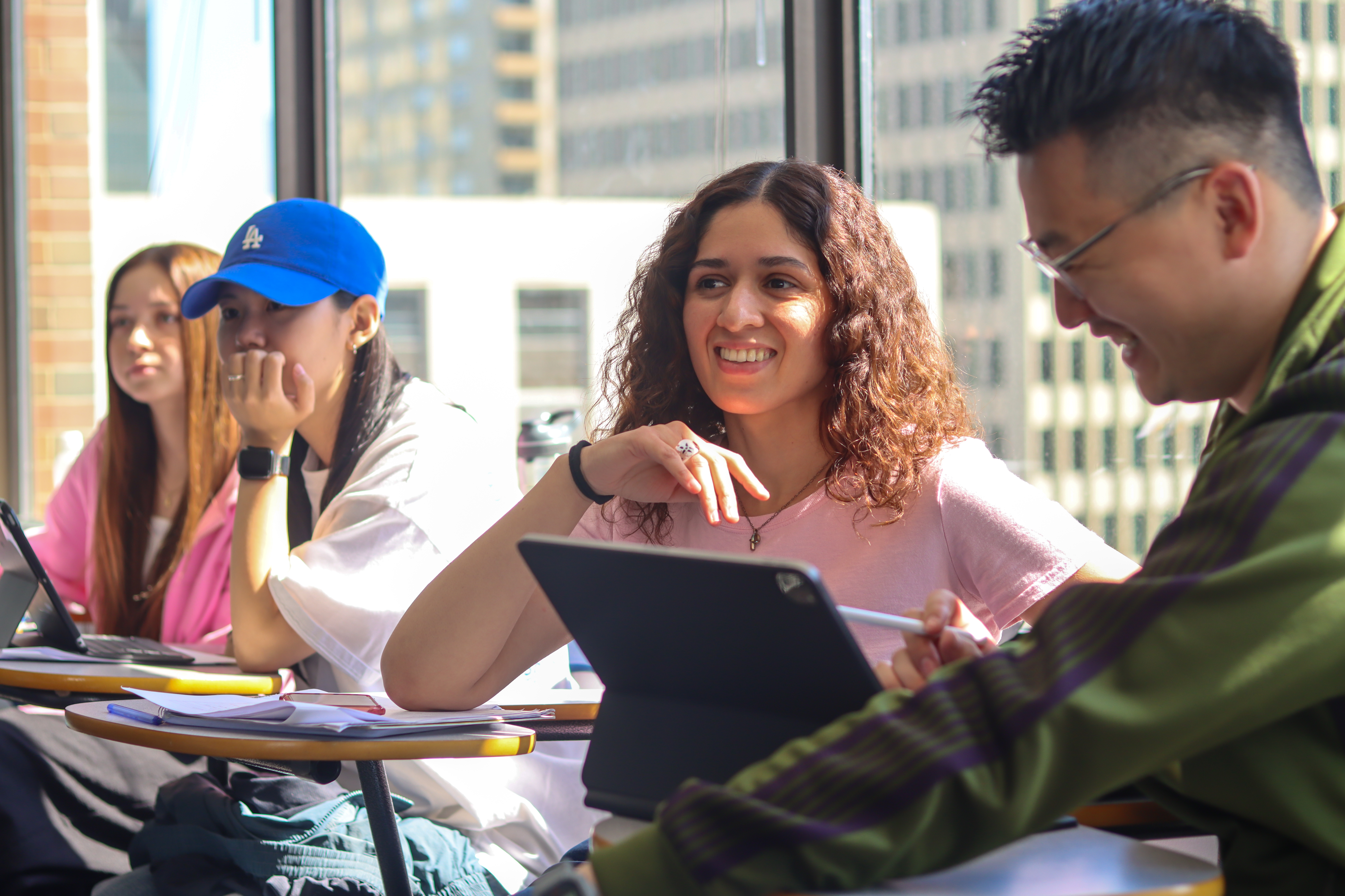 Four students in class at Global Village Calgary