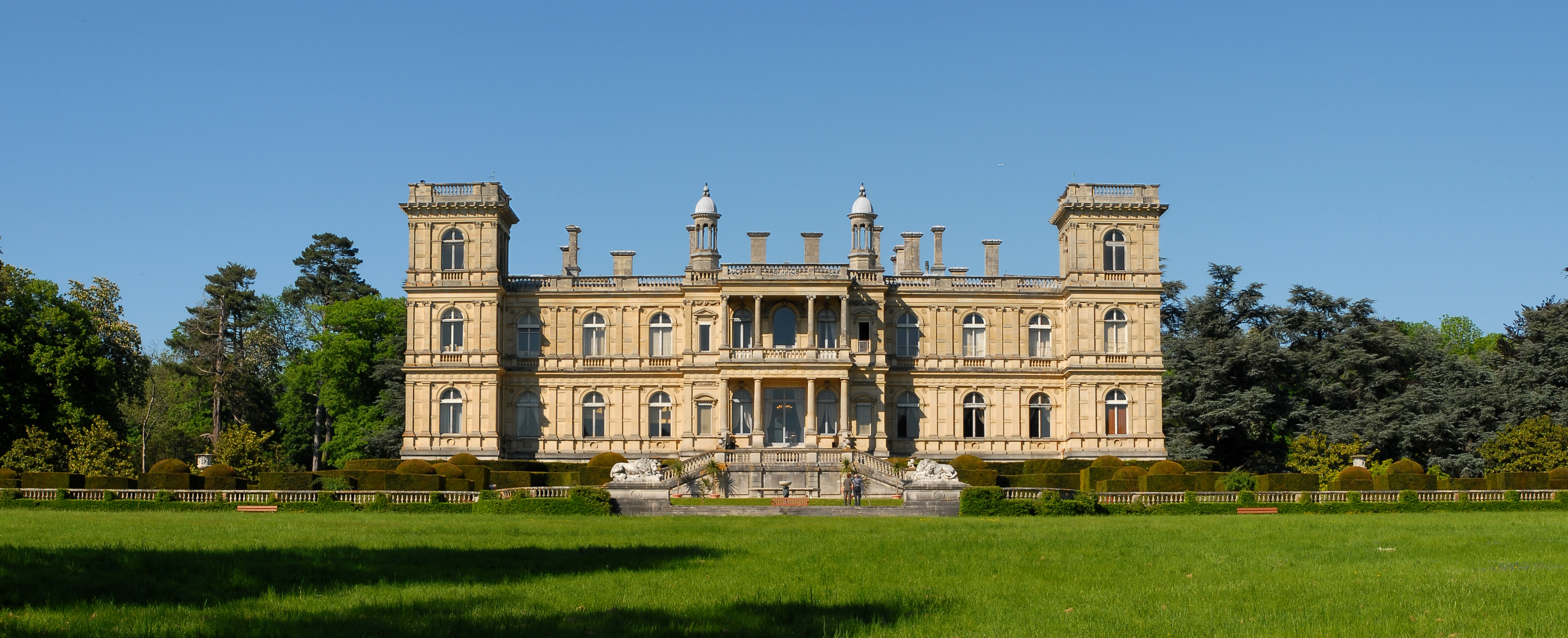 Historic building surrounded by greenery in Ferrières, Belgium
