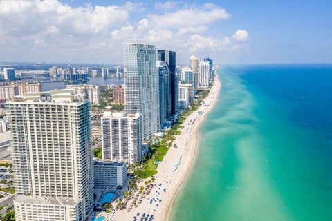 Waterfront in Sunny Isles Beach, Florida, USA, featuring high-rise buildings along the shoreline