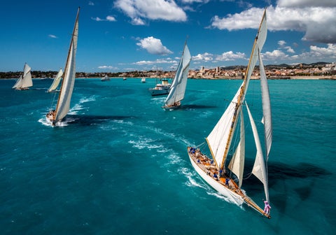 Boats sailing at Nice turquoise ocean, France