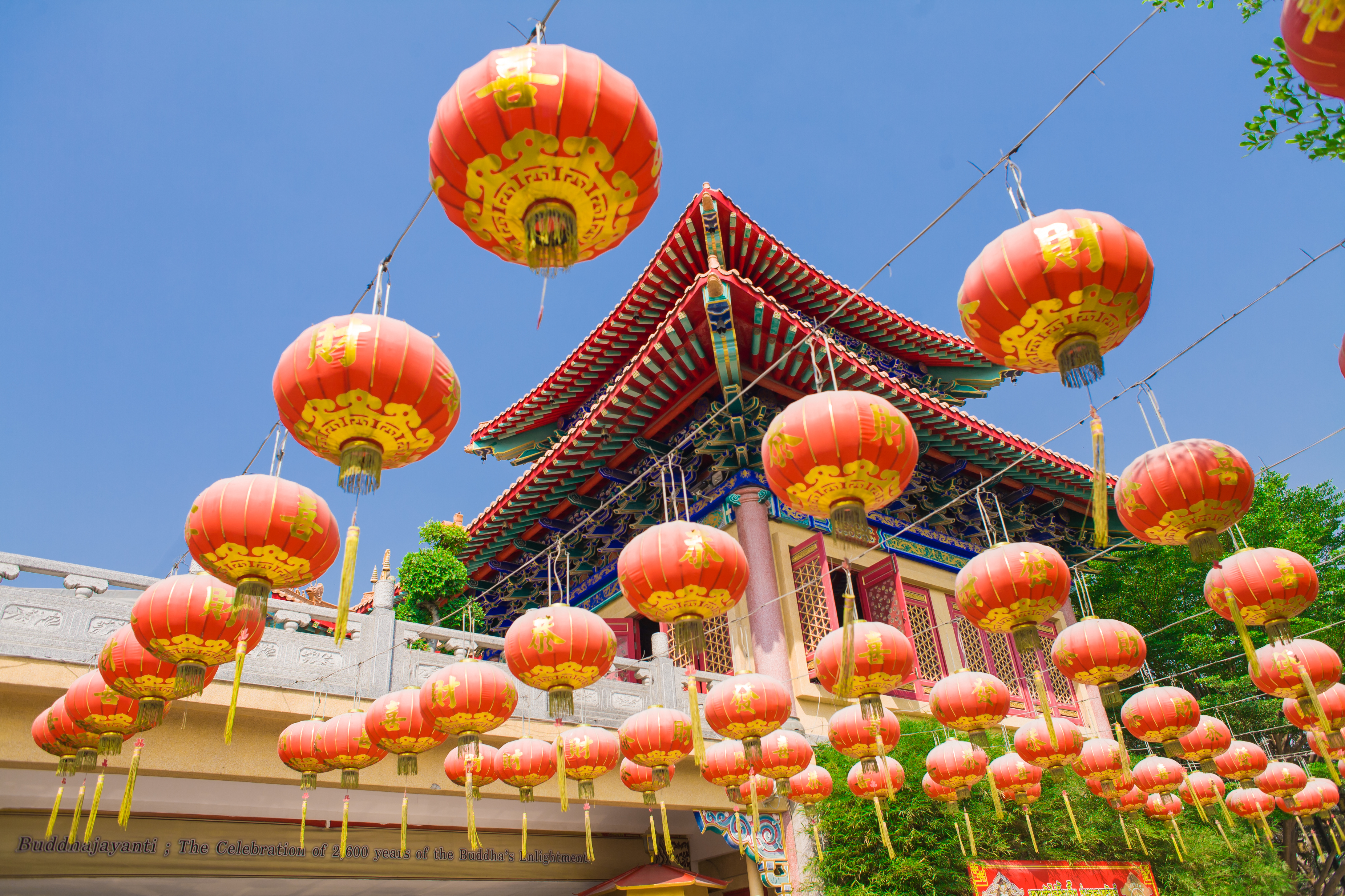 Classic decorative elements with Wat Phra Thong temple in the background, Phuket, Thailand