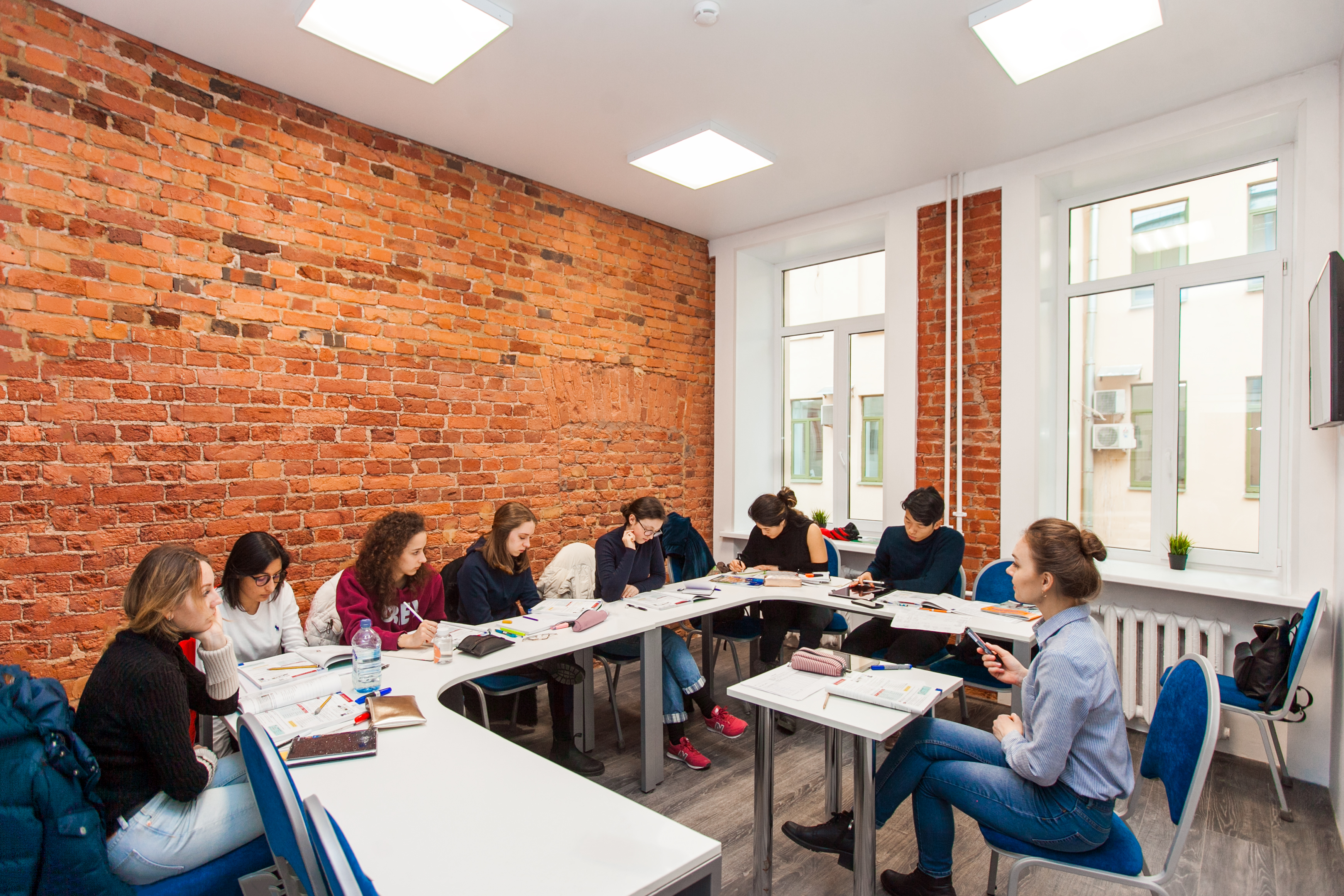 A group of students in class at Liden & Denz St. Petersburg