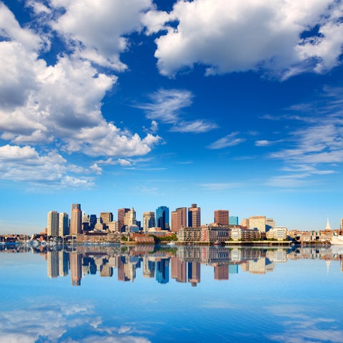 Boston skyline with sunlight glinting off the Charles River captures a stunning urban landscape