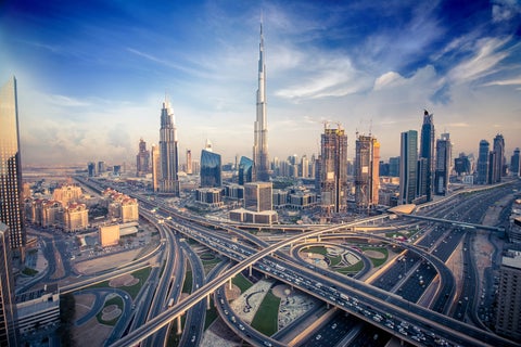 Aerial view of Dubai, United Arab Emirates, featuring the Burj Khalifa and surrounding road networks
