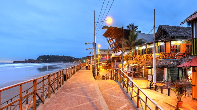 City Center on the seaside with mountains in the background at Montanita, Ecuador