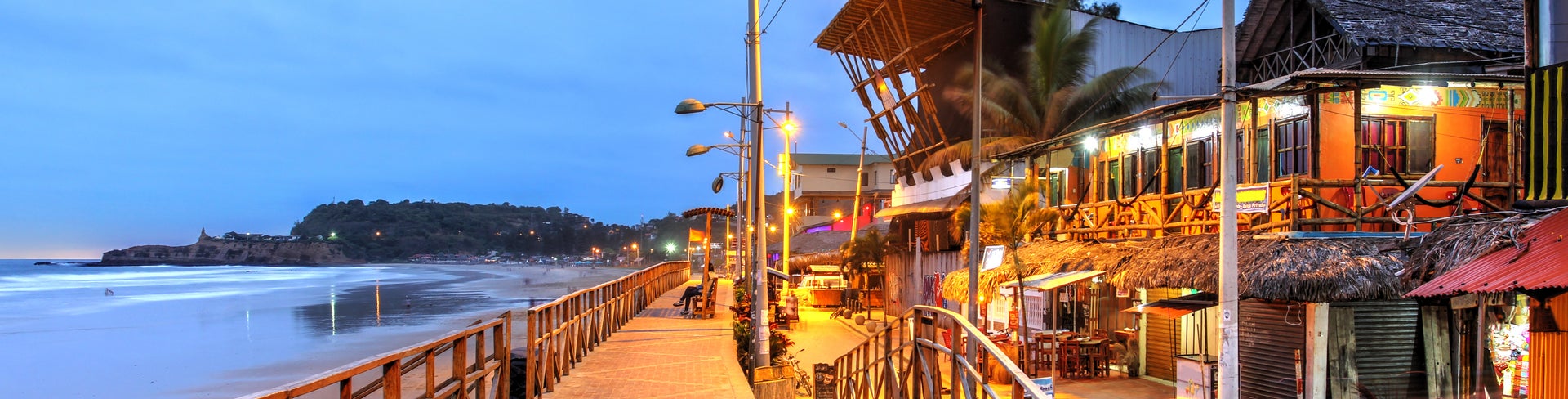 City Center on the seaside with mountains in the background at Montanita, Ecuador