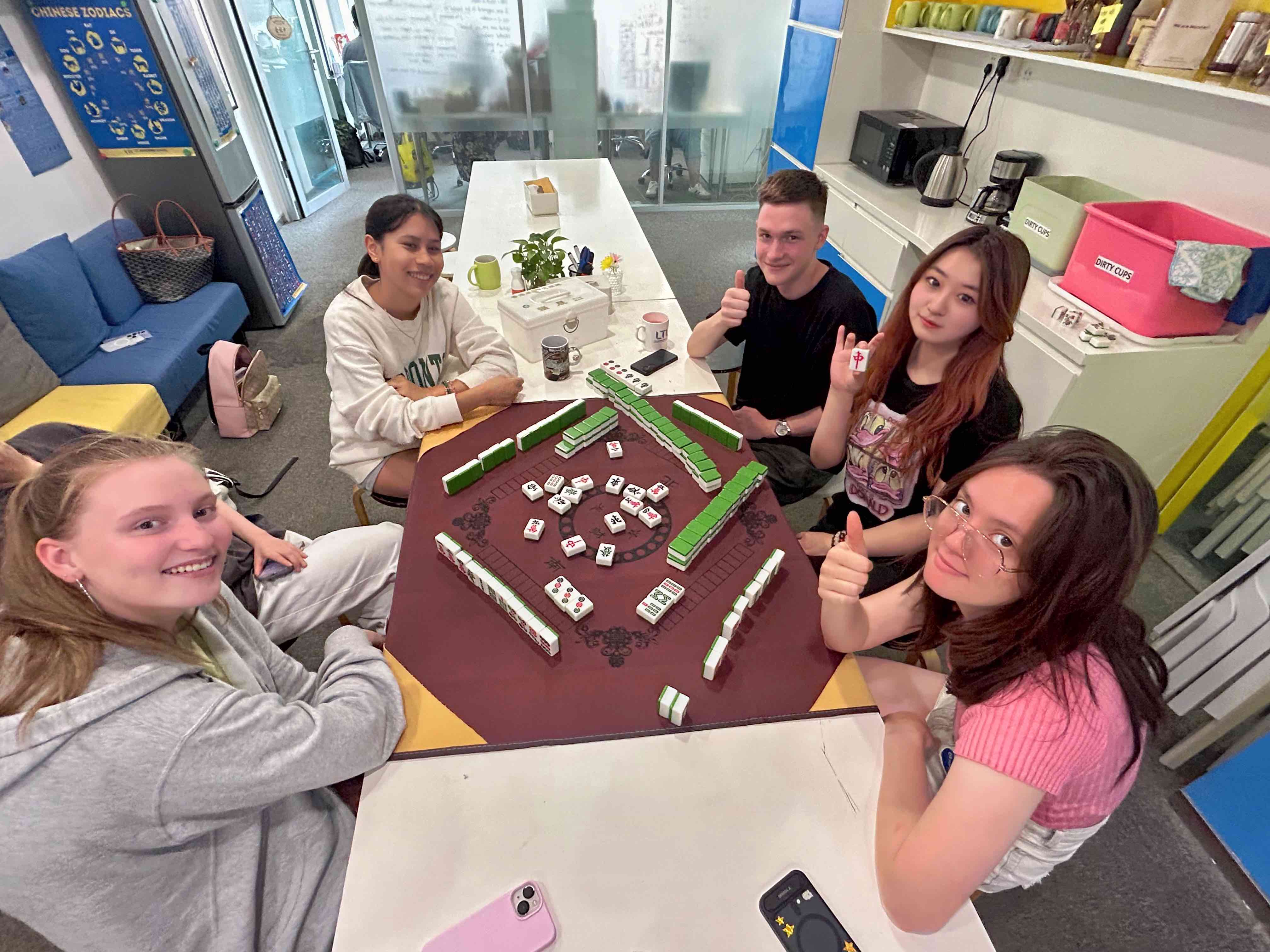 Students in school doing mahjong