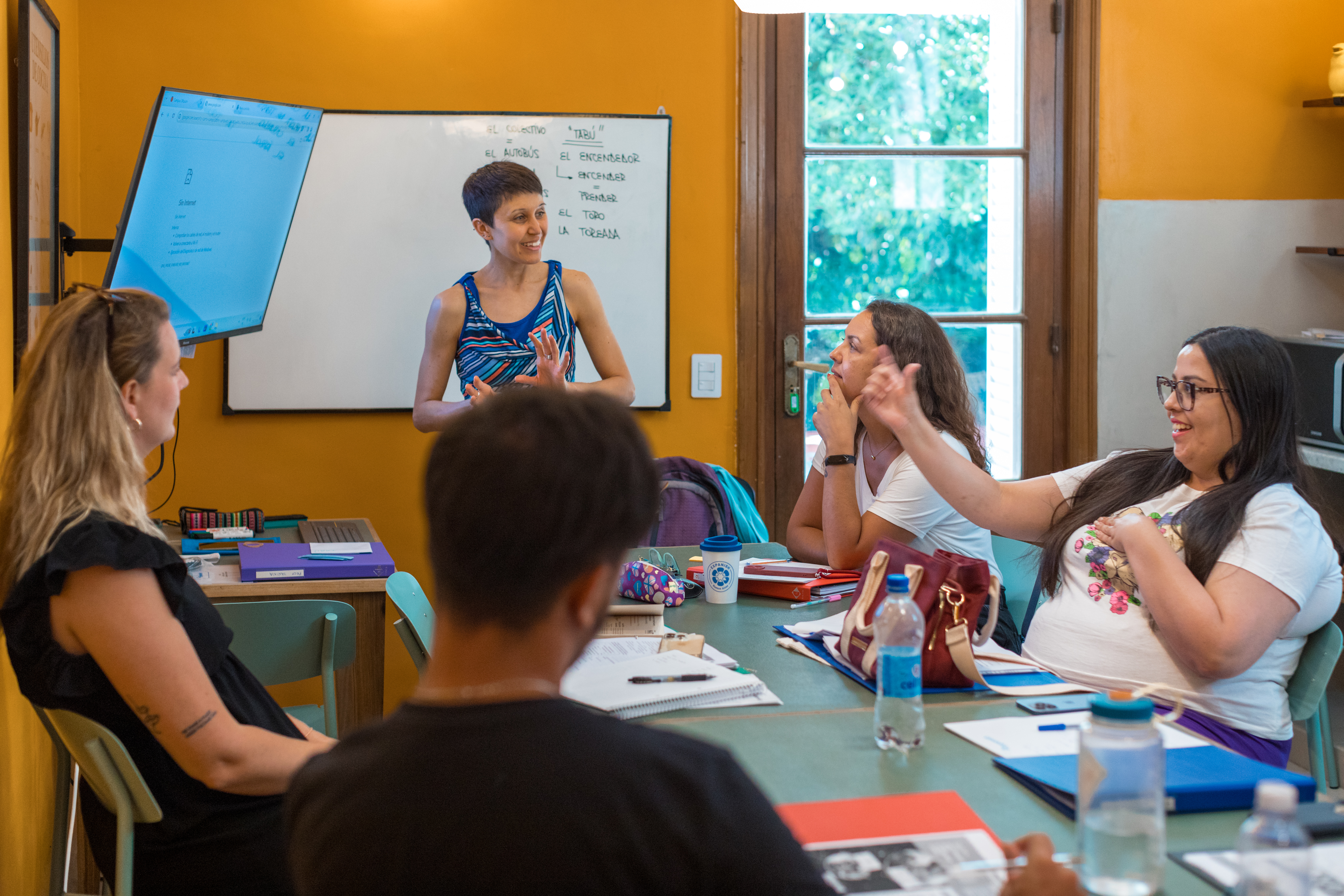 A teacher explaining a lesson to her students