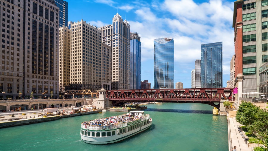 Ferry boat on Lake Michigan with view of Chicago downtown skyline and modern skyscrapers