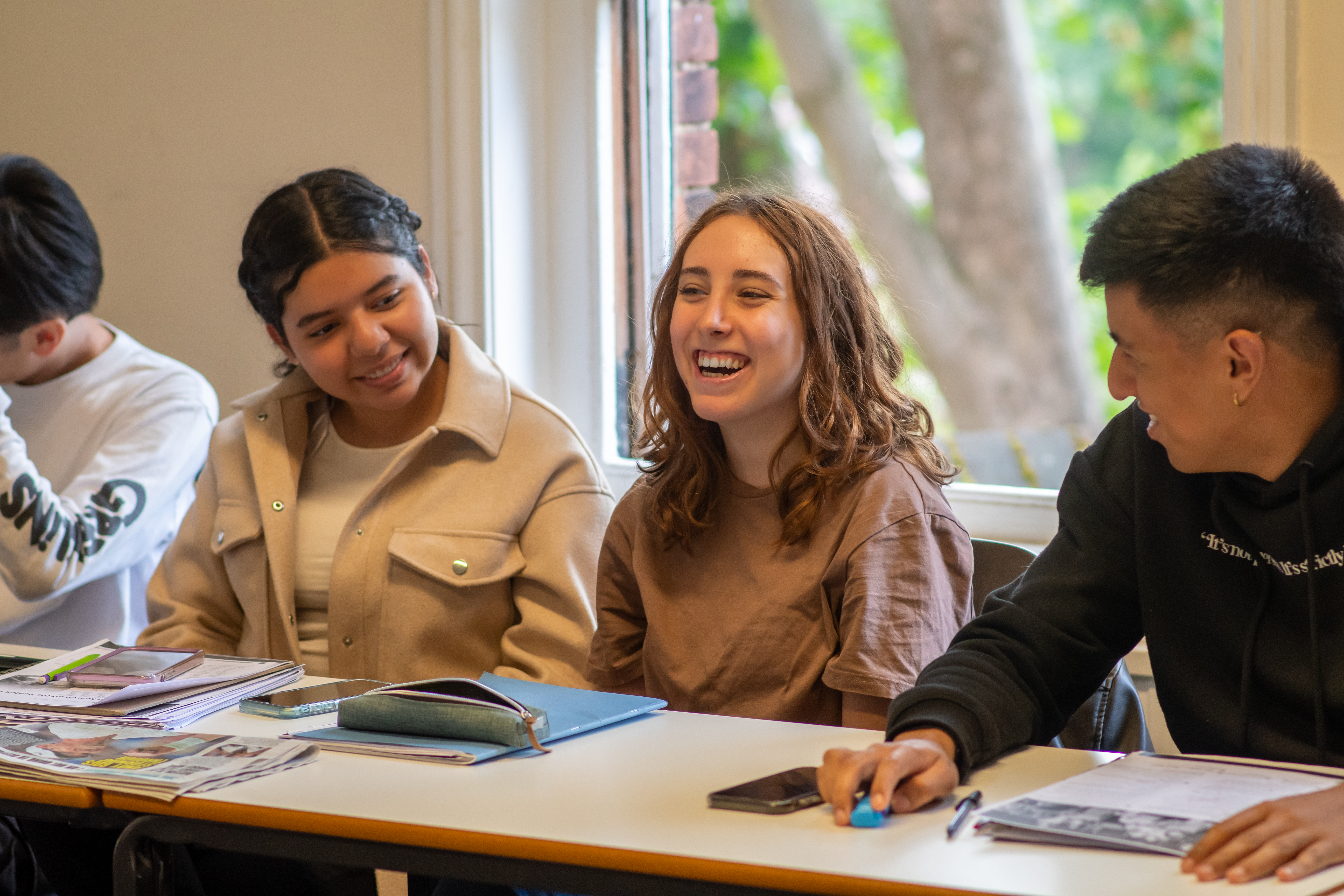 Four students in class at London Highgate College Programme