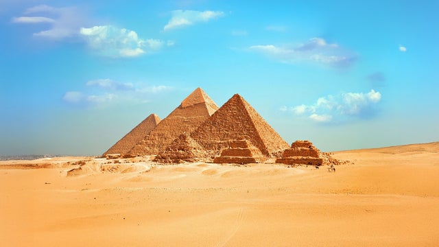 Ancient Egyptian pyramids of Giza in Cairo under a sunny sky