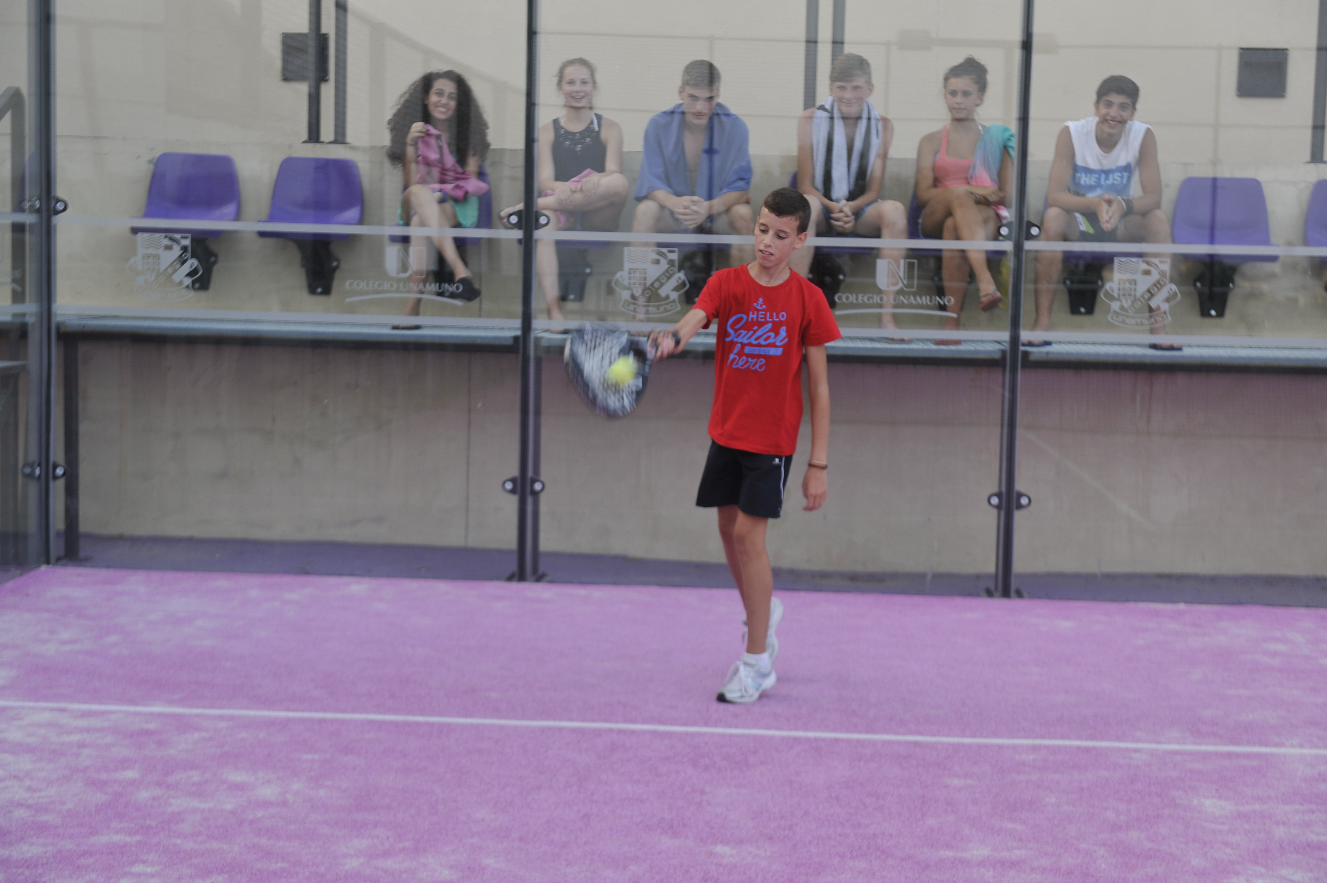 A student during a tennis lesson