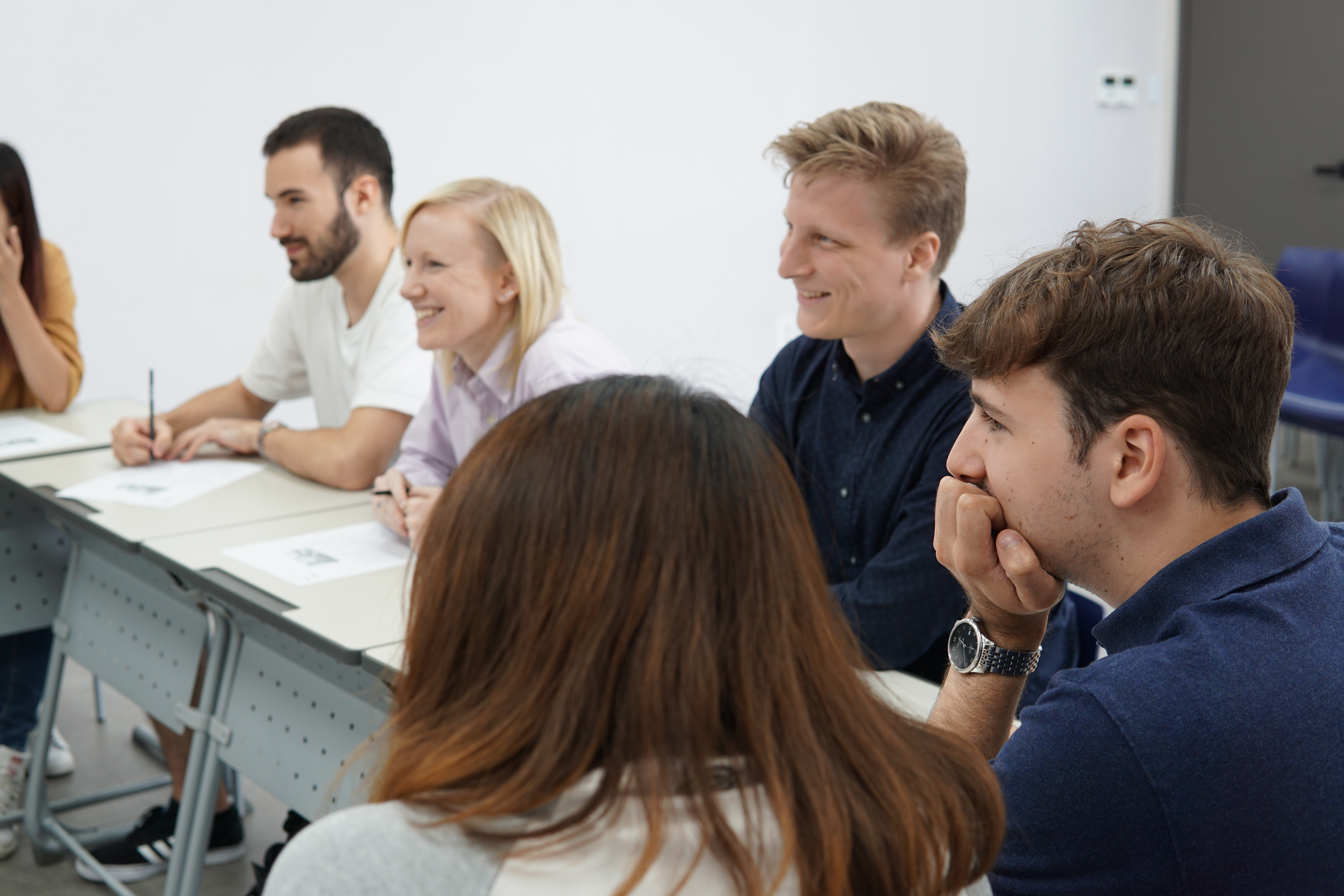 A group of students in class during a lesson
