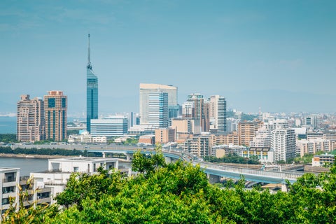 Panoramic view of Fukuoka skyline featuring Fukuoka Tower and Hakata Bay in Japan