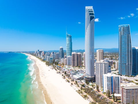 Aerial view of Gold Coast featuring white-sand beach and crystal blue water