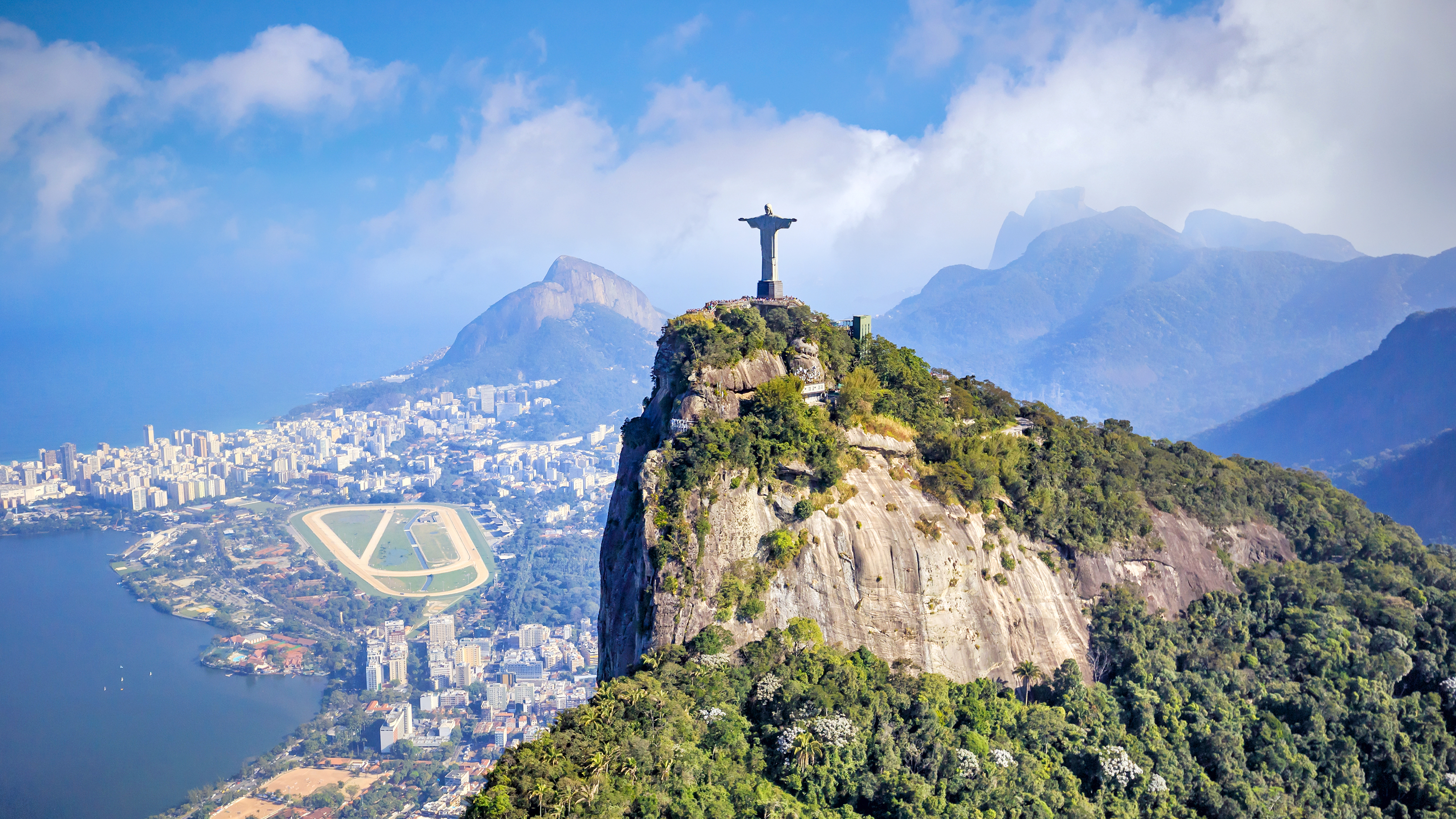 Aerial view of Christ the Redeemer, Sugarloaf and Rio de Janeiro cityscape, Brazil