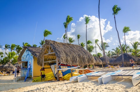 Beach Huts in white-sand and Palm Trees in Barbados South Coast
